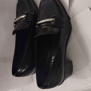 Ralph Lauren black patent leather heeled loafers.  Sheepskin lined. Size 8.